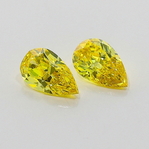 0.33 carat Pear Shape  VVS2 Fancy Vivid Yellow